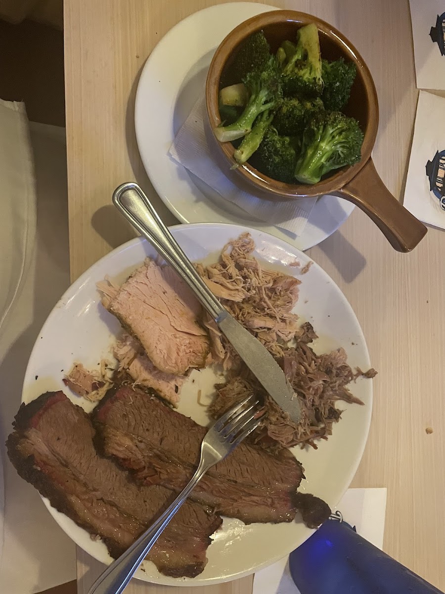 Brisket with samples of meat and broccoli on the side. So good!