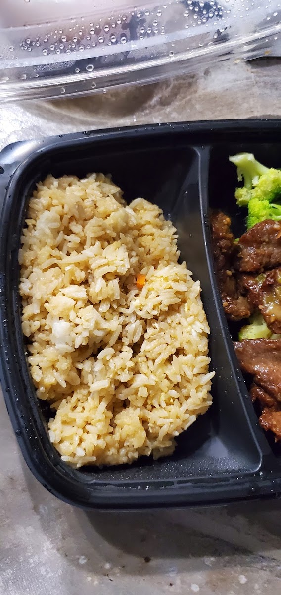 GF beef and broccoli, with wrong rice (suppose to be brown rice... it's def white rice with ??)