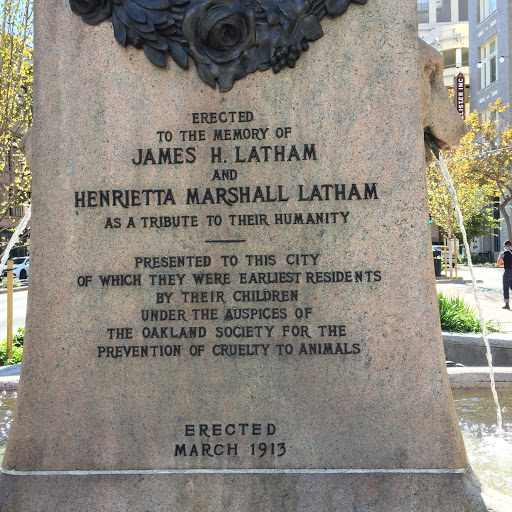 ERECTED TO THE MEMORY OF JAMES H. LATHAM AND HENRIETTA MARSHALL LATHAM AS A TRIBUTE TO THEIR HUMANITY  PRESENTED TO THIS CITY OF WHICH THEY WERE EARLIEST RESIDENTS BY THEIR CHILDREN UNDER THE...