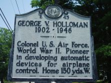 Colonel U.S. Air Force, World War II. Pioneer in developing automatic devices for airplane control. Home 150 yds. W.Plaque via North Carolina Highway Historical Marker Program, and is used with...