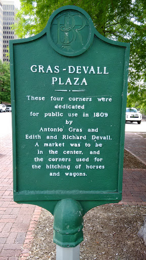 Gras-Devall Plaza - These four corners were dedicated for public use in 1809 by Antonio Gras and Edith and Richard Devall. A market was to be in the center, and the corners used for the hitching...