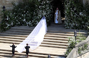 The combined effect of the train of Meghan Markle's wedding gown and five-metre-long veil was beautiful.