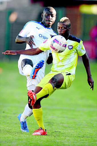 TUSSLE: Pentjie Zulu of Cosmos and Erick Chipeta of Chippa fight for the ball during their PSL match in Potchefstroom on Sunday Photo: Lefty Shivambu/Gallo Images