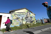 An image of former PAC leader  and intellectual Robert Sobukwe looms large in the street artwork  in  Langa township,  Cape Town. /Adrian de Kock