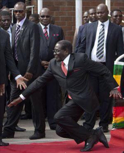 President Robert Mugabe falling Picture: AFP