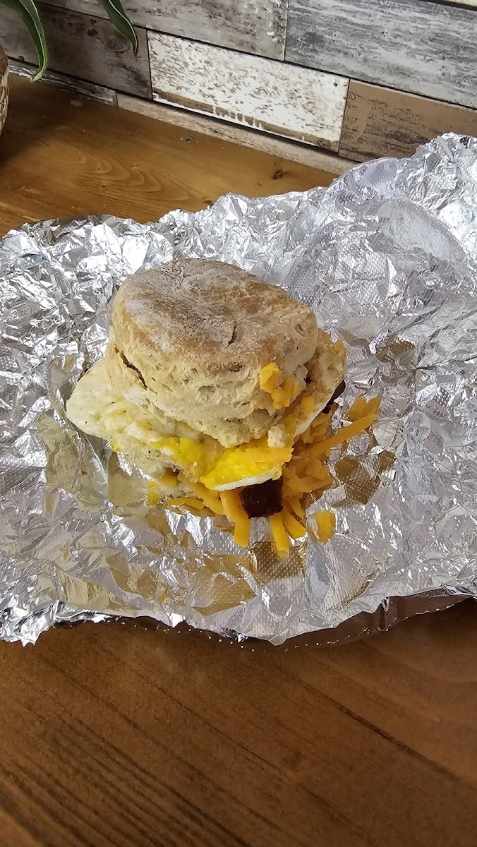 Breakfast biscuit with bacon & eggs.
