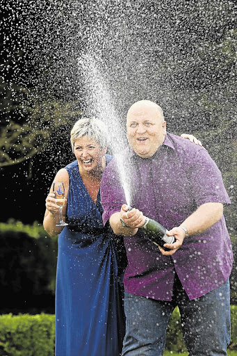 Adrian and Gillian Bayford, of Haverhill, Suffolk, in England won more than £148-million in the EuroMillions lottery Picture: OLI SCARFF/GALLO IMAGES