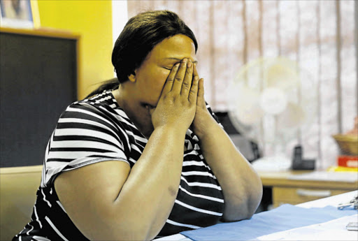 FEARFUL: Meggie Xalabile, who is a principal at Makinana Primary School, fears for her life after two men stormed into her office and attacked her last week Picture: SIBONGILE NGALWA