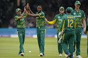 South Africa bowler Kagiso Rabada (l) is congratulated after dismissing Alex Hales during the 3rd Royal London Cup match between England and South Africa at Lord's Cricket Ground on May 29, 2017 in London, England.  (Photo by Stu Forster/Getty Images)