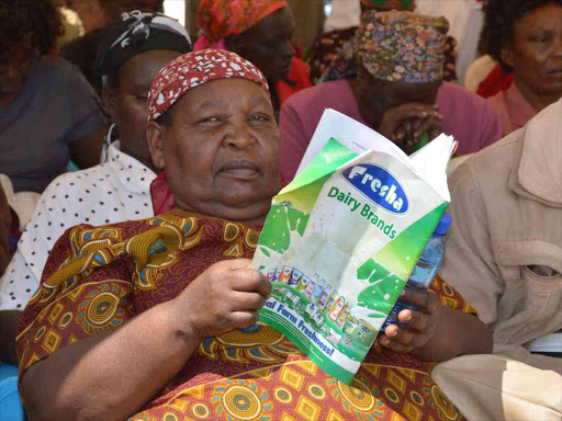 Members of Githunguri Dairy Farmers Co-operative Society during the AGM at the Githunguri Stadium on Saturday/ STANLEY NJENGA