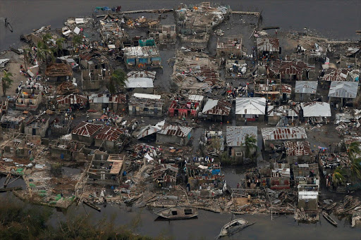 Destroyed houses are seen in a village after Hurricane Matthew passes Corail, Haiti, October 6, 2016. REUTERS/Carlos Garcia Rawlins