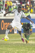 TOUGH COOKIE: Nigeria striker Emmanuel Emenike on the attack
       Photo: Gallo Images