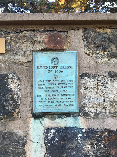 Davenport Bridge of 1856 Near this spot and upon these stones rested the first bridge to span the Mississippi River. The first train consisting of a locomotive and eight cars passed over the...