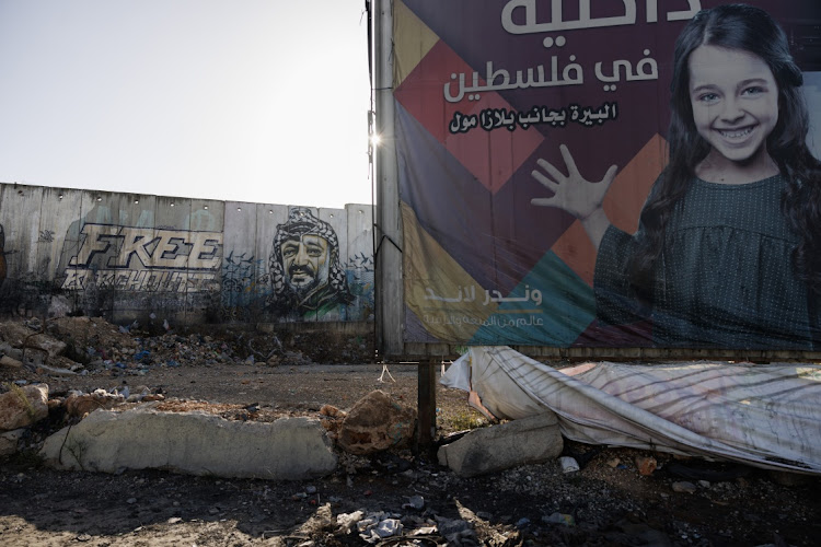 A mural is shown on Israel's separation wall between Jerusalem and Ramallah depicting the former chairman of the Palestine Liberation Organization, Yasser Arafat, in Ramallah, West Bank. File photo: DAN KITWOOD/GETTY IMAGES