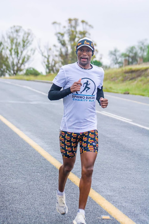 Runner Siphiwo Bukani organises an annual charity run in aid of schoolchildren in Dikeni, collecting donations of school shoes, shirts and stationery.