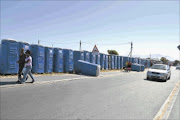 HAZARD: A row of temporary toilets