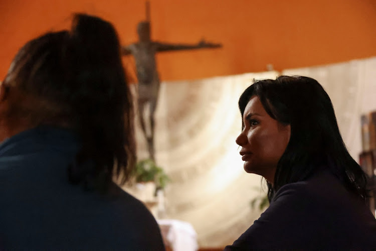 Carla, a transgender woman, stands inside a church inTorvaianica, near Rome, Italy, November 16 2023. Picture: ANTONIO DENTI/REUTERS