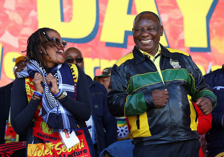 President Cyril Ramaphosa dances with Cosatu president Zingiswa Losi at Cosatu's national worker’s day rally at Athlone Stadium in Cape Town.