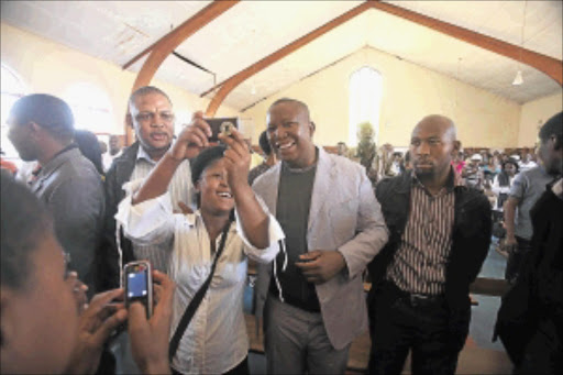 MR POPULAR: ANC Youth League leader Julius Malema attends a church service in Ratanda. He is rallying for people to march on Thursday and Friday in support of nationalisation of mines. PHOTO: ALON SKUY