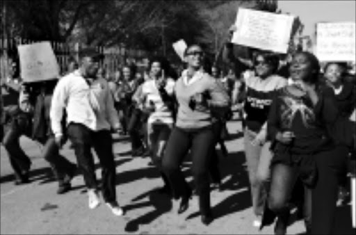 20090723PMO:Eskom employees protest outside the Megawatt Park head office yesterday demanding 14 percent salary increased or more money.PIC: PETER MOGAKI. 23/07/2009. © SOWETAN