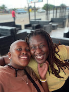 Cynthia Maboya, left, and her partner sangoma Amina Deka Asmam, also known as Mkhulu Thandolwethu.