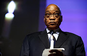 President Jacob Zuma holding a candle. File photo.