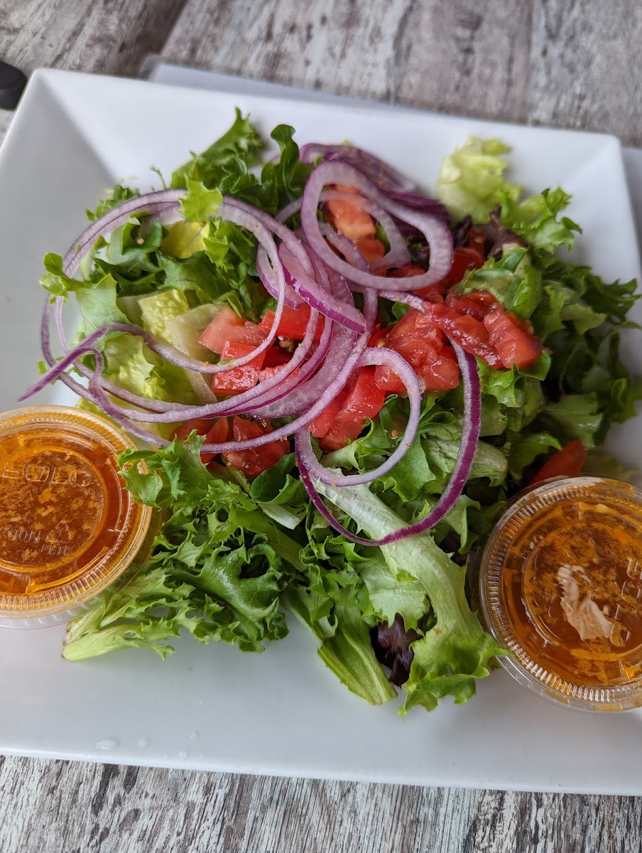 Evidence of croutons on salad after it was sent back and returned. Completely unsafe.