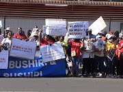 Self-proclaimed prophet Shepherd Bushiri's supporters came out in numbers and braved the scorching sun as they sang songs in support of their 