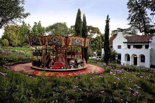 The luxurious Le Jardin private villa in Stellenbosch includes an authentic Parisian carousel in the back garden.