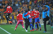 Kaitano Tembo coach of Supersport United celebrates with his bench during the MTN8 Semi Final 2nd Leg match between Kaizer Chiefs and Superspot United on the 01 September 2018 at FNB Stadium.