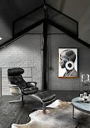An Eames chair invites you to sit and relax in the top-floor chill area.