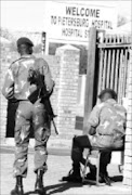 FILE PHOTO: Police at Polokwane Hospital in Limpopo during a previous incident when staff members protested over bad working conditions. Pic. Elijar Mushiana. 10/02/2010. © Sowetan.