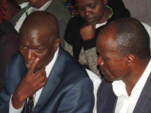 Migori Senator-elect Ben Oluoch chats with Governor Okoth Obado after being declared winner by IEBC Returning Officer Charles Mutai, August 11, 2017. /MANUEL ODENY