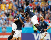 France's Paul Pogba celebrates scoring their second goal with teammates during their World Cup match against Australia at Kazan Arena, Kazan, Russia on June 16, 2018.