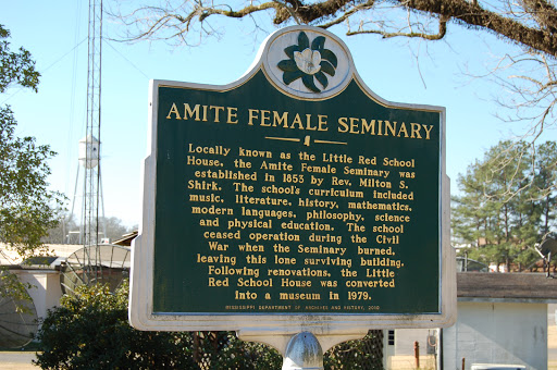 Locally known as the Little Red School House, the Amite Female Seminary was established in 1853 by Rev. Milton S. Shirk. The school's curriculum included music, literature, history, mathematics,...