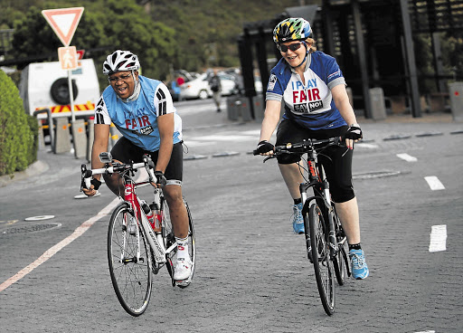 IN TRAINING: Sports Minister Fikile Mbalula with Western Cape premier Helen Zille on Table Mountain Road preparing themselves for the Cape Argus Cycle Tour, in which they will promote anti-doping Picture: ESA ALEXANDER