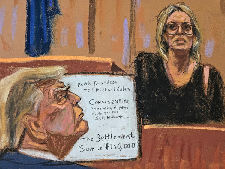 Former US president Donald Trump watches as Stormy Daniels testifies in the Manhattan state court in New York, the US, May 7 2024, in this courtroom sketch. Picture: REUTERS/JANE ROSEBERG