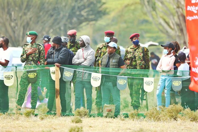 Security officers and participant in Naivasha for safari rally June 24, 2022.