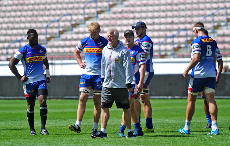The Stormers head coach Robbie Fleck chats to his players during a training session at Newlands Rugby Stadium, Cape Town on 15 March 2018.
