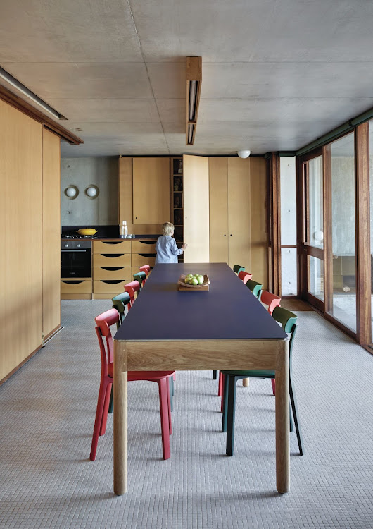 The dining table was designed by Pienaar “to suit the space and… accommodate all 10 of the occupants of the house”. Constructed from hardwood with a Fenix NTM top, the table is surrounded by lightweight APC chairs by Jasper Morrison for Vitra, and the entire dining suite can easily be moved, so it can be used in a number of places around the home.