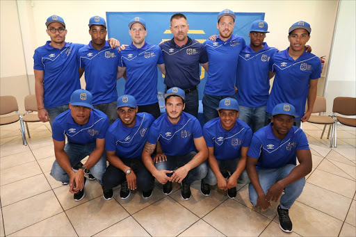 Cape Town FC New signings (Back L to R) James Brown, Samora Motloung, Matt Sims, Cape Town FC coach Eric Tinkler, Renars Rode, Tsepo Gumede and Shaquille Abrahams, (Front L to R) Robyn Johannes, Ebrahim Seedat, Roland Putche, Duncan Adonis and Never Ngcuka during the Cape Town City FC Press Conference held at the Greek Club on August 04, 2016 in Cape Town, South Africa. (Photo by Shaun Roy/Gallo Images)
