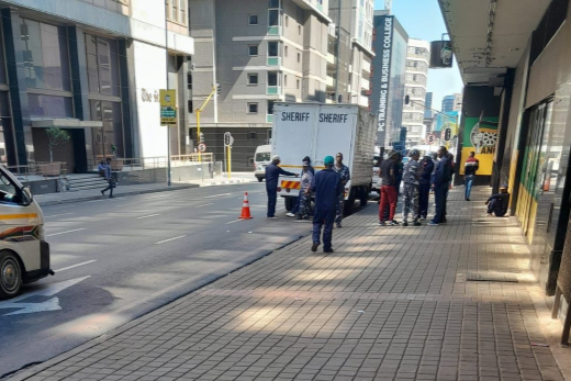 The sheriff of the court spotted outside the ruling party's headquarters in the Johannesburg CBD on Monday morning.