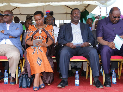 Bomet Governor Isaac Rutto, his wife Esther, ANC leader Musalia Mudavadi and Kisumu Governor Jack Ranguma during Rutto’s thanksgiving rally in Bomet on Sunday /FELIX KIPKEMOI