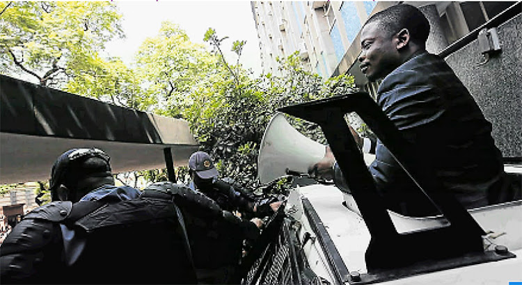 Shepherd Bushiri celebrates the announcement of his bail.