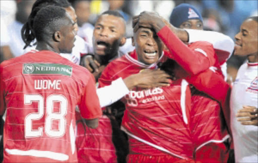 LIGHTNING STRIKES: Free State Stars' Paulos Masehe is congratulated by teammates after scoring the winner against Orlando Pirates during their Nedbank Cup clash at Orlando Stadium on Saturday. Photo: Gallo Images