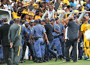 Kaizer Chiefs head coach Steve Komphela leaves the pitch after his team bombed out of the Nedbank Cup on Saturday.  