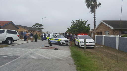 A Port Elizabeth man is in a critical condition in Livingstone Hospital after he was mauled by two pitbulls.