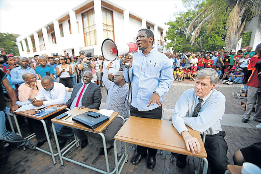 OPPOSING SIDES: University of Fort Hare vice-chancellor Mvuyo Tom addresses students demands at the campus in Alice yesterday Picture: MARK ANDREWS