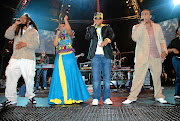 Afro-pop group Bongo Maffin performing live on stage. From left to right are Jah Seed, Thandiswa Mazwai, Stoan Seate and Speedy.
