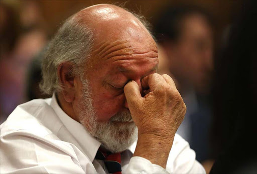 Reeva Steenkamp's father Barry (C) reacts during judgment of South African Paralympic athlete Oscar Pistorius in his murder trial in Pretoria, South Africa, 12 September 2014. Judge Thokozile Masipa found South African Paralympic athlete Oscar Pistorius not guilty of the murder of Reeva Steenkamp in February 2013 but guilty of culpable homicide. EPA/ALON SKUY / POOL